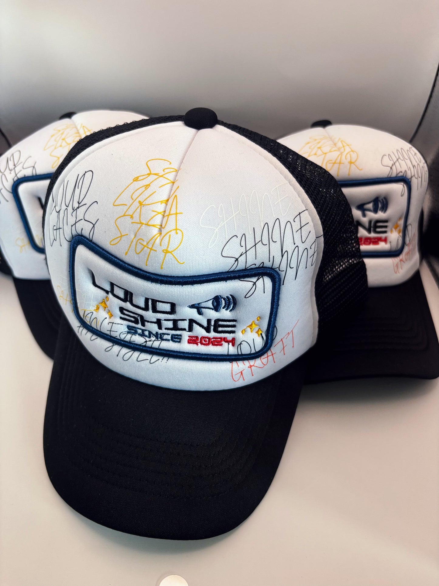Loud Shine Trucker Hats